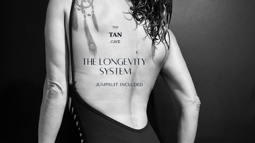 Person with a tattoo on their back and text about a tanning system.